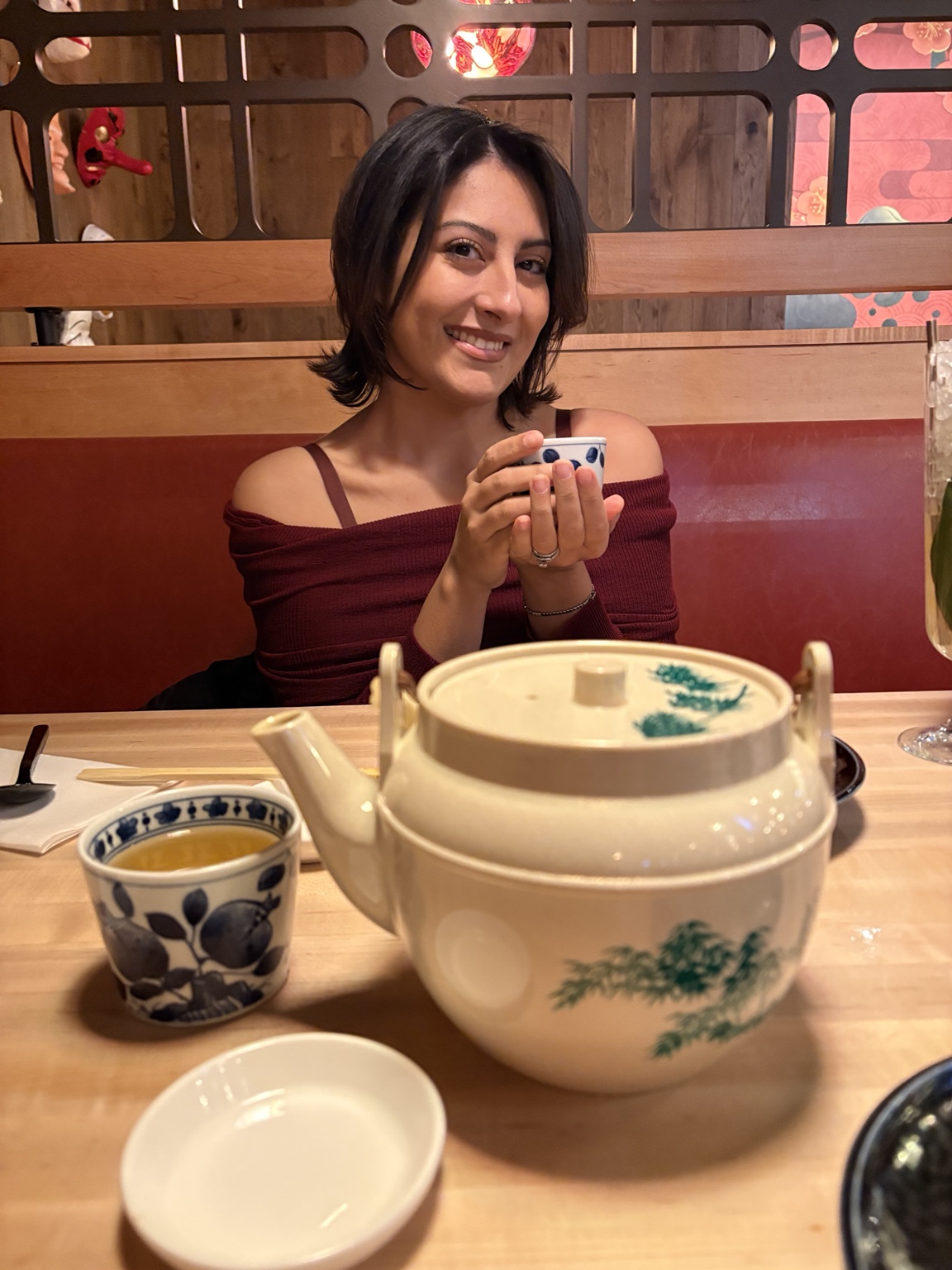 The baker behind The Nourishing Loaf holding a warm cup of tea